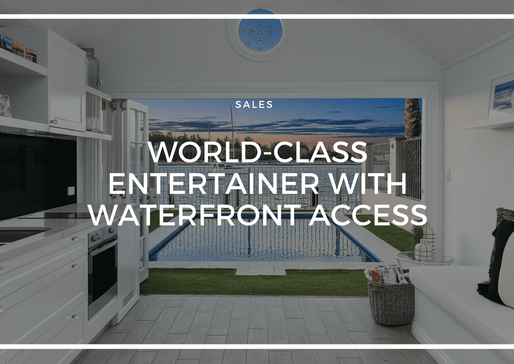 WORLD-CLASS ENTERTAINER WITH WATERFRONT ACCESS